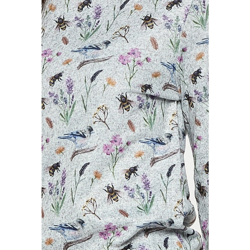 Top tipo jersey de manga larga con cuello redondo y estampado floral de pájaros y abejas