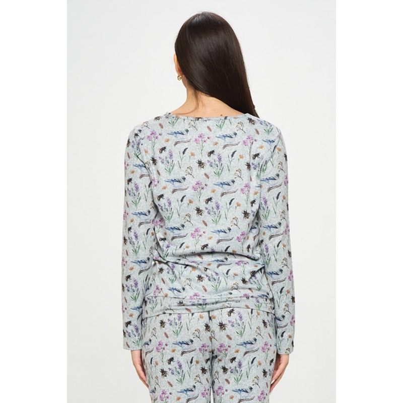 Top tipo jersey de manga larga con cuello redondo y estampado floral de pájaros y abejas