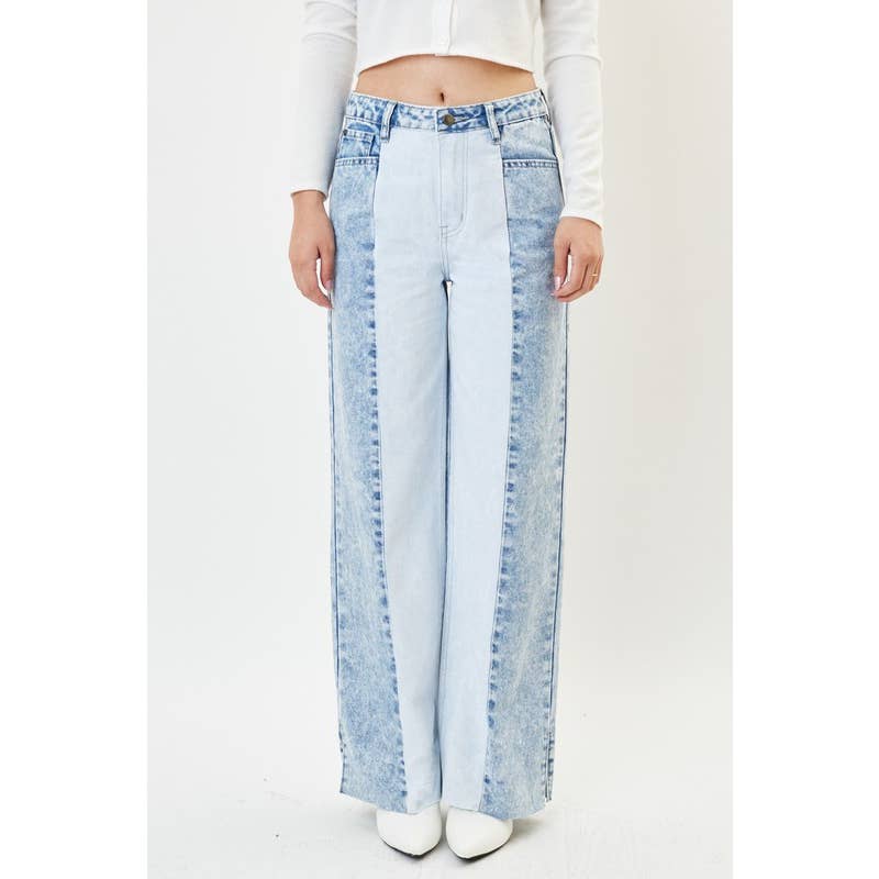 Jean large taille haute délavé à l'acide avec empiècements